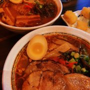 two bowls of ramen and a bowl of soup
