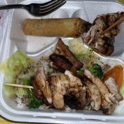 Plate number three. Teriyaki chicken skewers with 2 imperial rolls.