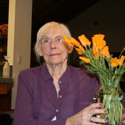 Resident with flowers from the backyard.