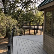 a view of a deck with railings