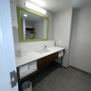 Sink area from the shower/toilet area perspective.