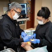 Dr. Tawatari and an assistant providing quality dental at our Philadelphia Square location.