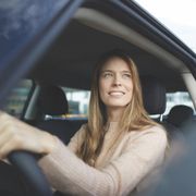 a woman driving a car