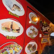 a menu on a food truck