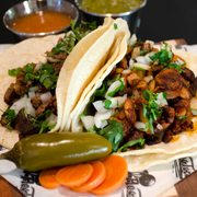two tacos and a pickle
