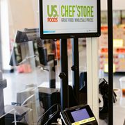 a cash register and a sign