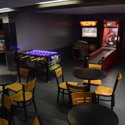 a row of pinball machines