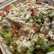 Supreme Carne Asada Nachos.  They forgot to add the avocado
