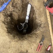 Repaired valve under bocce ball court