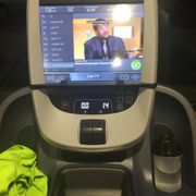 treadmill has its own television, phone charger, 2USB inputs for watching your own media if you want, and a headphone plug to watch DirecTV