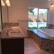 a bathroom with a large tub