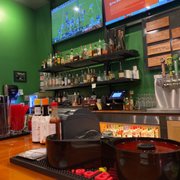 4 TVs over the bar - 5 other TVs for some good viewing