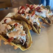 The pulled pork tacos are very good! Way more food than just a starter appetizer