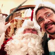 Owners son with Santa- many beards and wigs also for sale