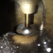 This is an intake valve that had carbon buildup. This caused a misfire and check engine light