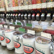 a row of buckets of candy