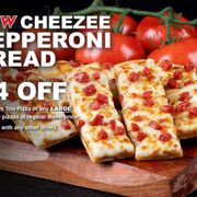 a wooden cutting board with slices of pizza on it