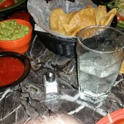 Complimentary chips and salsa along with an order of guacamole.