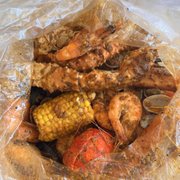 a large pile of food wrapped in plastic