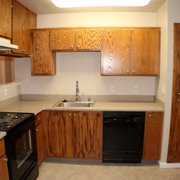 All appliances are black. One bedrooms also have a microwave installed