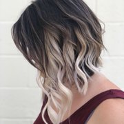 Bold pops of Hair Lingerie extensions add fullness along with a gorgeous platinum blonde