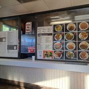 Here's the menu board at Egg Roll King. The dinner combos are $9.99, but the web page says $7.99.