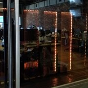 Second floor of a 3 story glass server room.  We installed LED lighting to show off the servers...  Everyone needs a hobby.