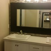Master Vanity with dual sinks, vanilla ice counter tops and tile back splash all the way to the celing!