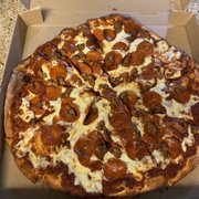 a pepperoni pizza in a box