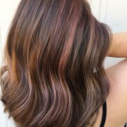 Baby pink and caramel highlights.