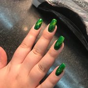 Magnetic nail polish with green tigers eye