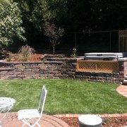 a hot tub in the backyard