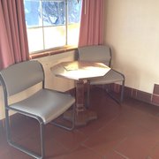Idea: Wipe table & chairs (as well as everything else in the room) off w/ disinfectant wipes if your planning on staying here.