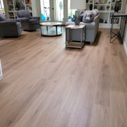 a living room with hardwood floors