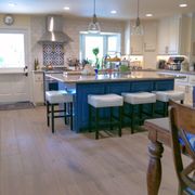 While the rest of the house has a more traditional style, the kitchen is a perfect example of the farmhouse kitchen style.