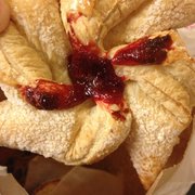 a person holding a pastry