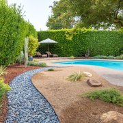 Low maintenance landscaped path to pool in Chico, CA