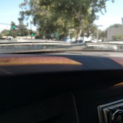 No one even bothered to pull up the wipers and wash the part beneath them.