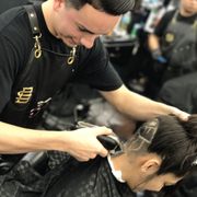 Chuy the Barber with the fresh designs on a female that wanted something different