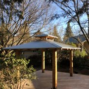 a gazebo in a backyard