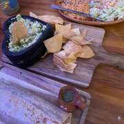 MAs burrito. Mas guacamole and chips. Cheese enchiladas