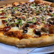 a whole pizza with toppings