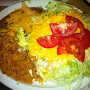 Tostada w added tomatoes.  House dressing w side of rice and beans