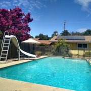 Pool amenities include bigger than average size pool with slide. Deep end is 8 ft shallow end is 3ft.