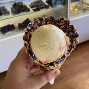 Strawberry cheesecake ice cream cone