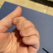 Finger nails with gel on the skin.