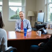 Brad conducting an annual insurance review.