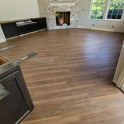 a living room with hardwood floors