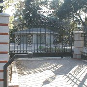 Arched rolling gate and fence