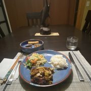 Grilled chicken paired w papaya salad, steamed jasmine rice and their Thai chili garlic dipping sauce for the grilled chicken.